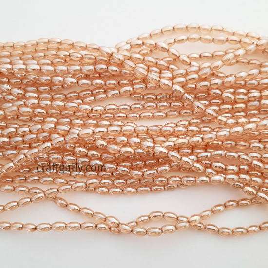 Glass Beads 7mm Oval - Trans. Golden Lustre - 1 String