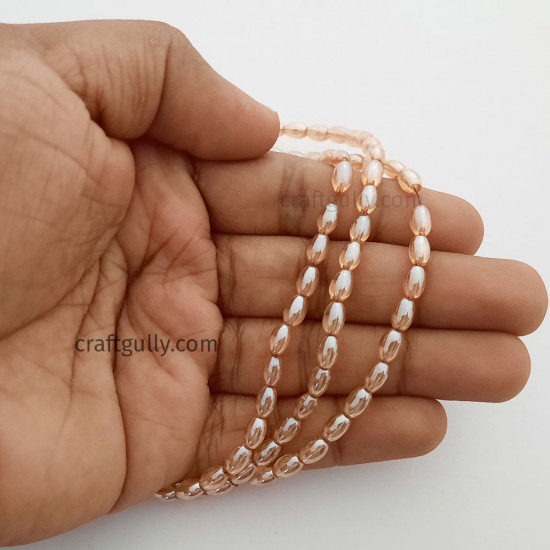 Glass Beads 7mm Oval - Trans. Golden Lustre - 1 String / 100 Beads