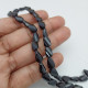 Glass Beads 9mm Oval Twisted Faceted - Black - 1 String / 30 Beads