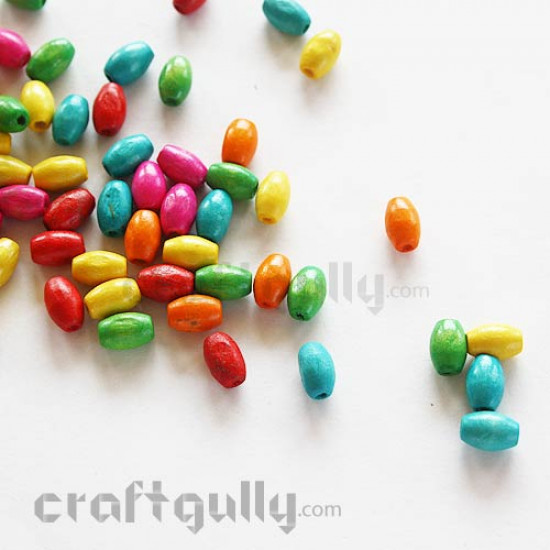 Wooden Beads 7mm - Oval - Assorted - 10 gms