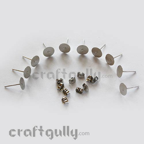 flat silver stud earrings