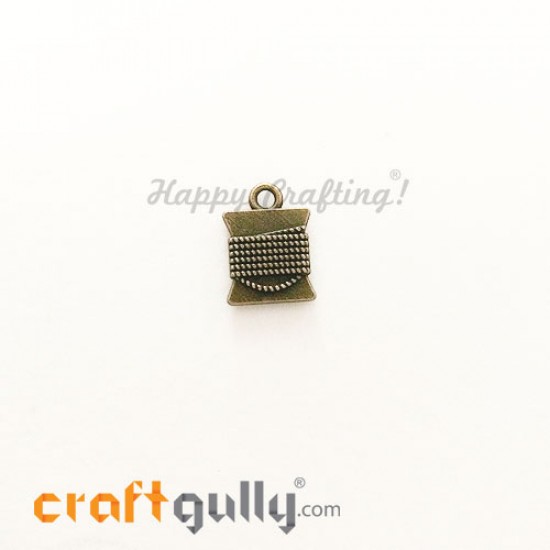 Charms / Elements 15mm Metal - Sewing Thread - Bronze - Pack of 1 Charms / Elements 15mm Metal - Sewing Thread - Bronze - Pack of 1